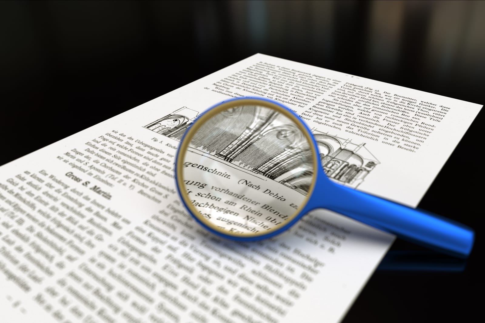 A magnifying glass over a printed page