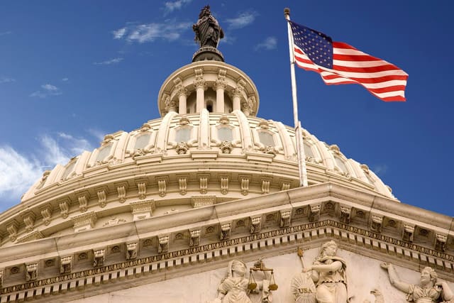 The US Capitol dome and flag
